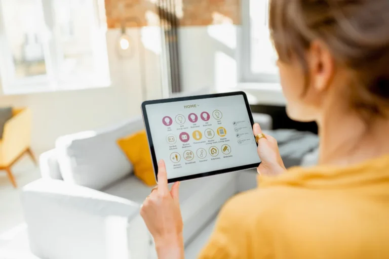 a girl operating smart home devices from her tablet