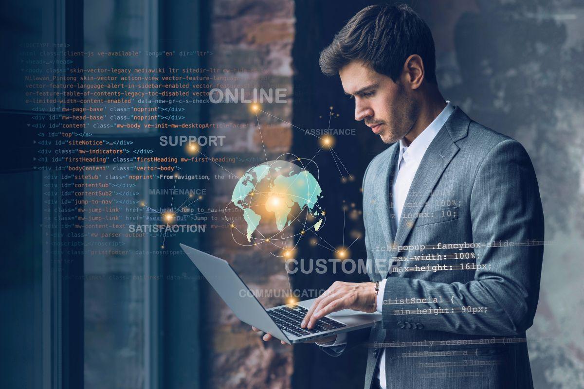 a suited person using ai agent on his laptop holding in his hands