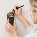 how to use stud locators to locate studs in a wall